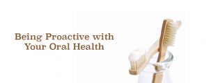 toothbrushes and toothpaste in jar so you can be proactive with oral health
